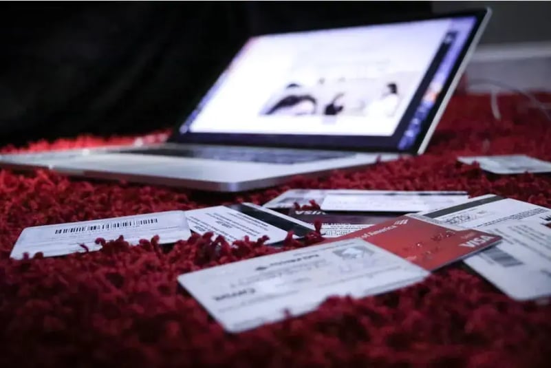 credit-cards-laying-next-to-laptop