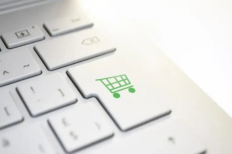 depiction-of-a-cart-button-on-a-keyboard-signifying-a-sales-action