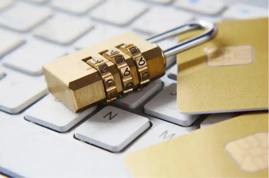 golden-padlock-sitting-on-top-of-a-keyboard
