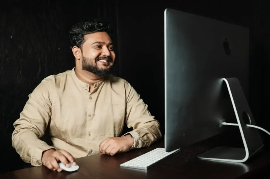 man-sitting-at-a-desk