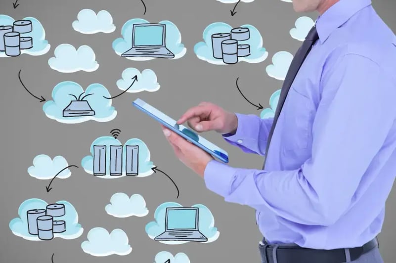 man-with-tablet-and-clouds-background-icons
