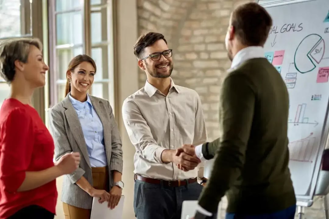 men-shaking-hands-during-business-meeting