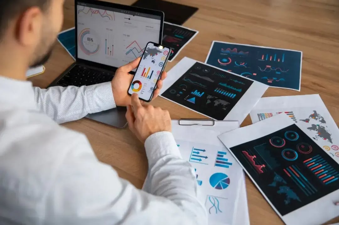 office-workers-using-finance-graphs