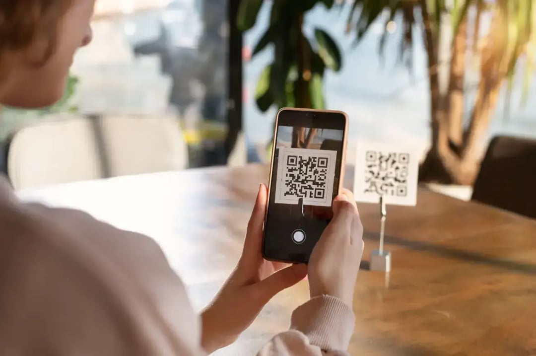 person-scanning-qr-code