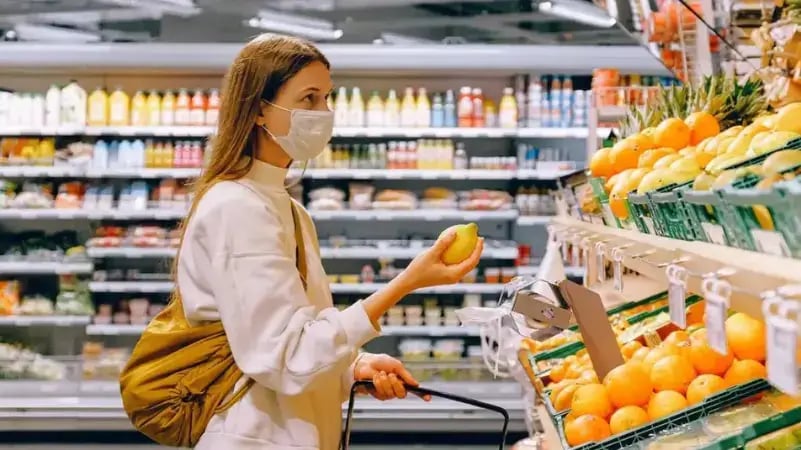 person-shopping-for-fruit
