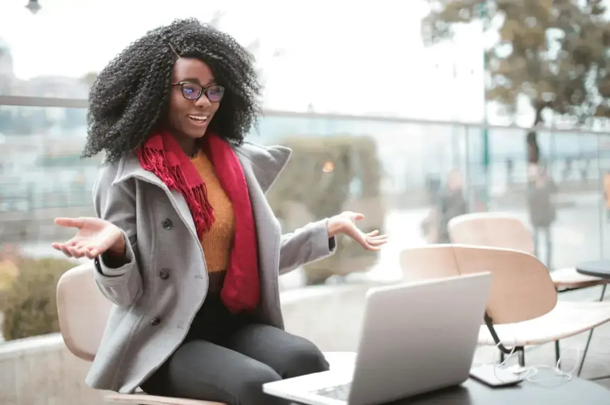 person-using-laptop-outdoors