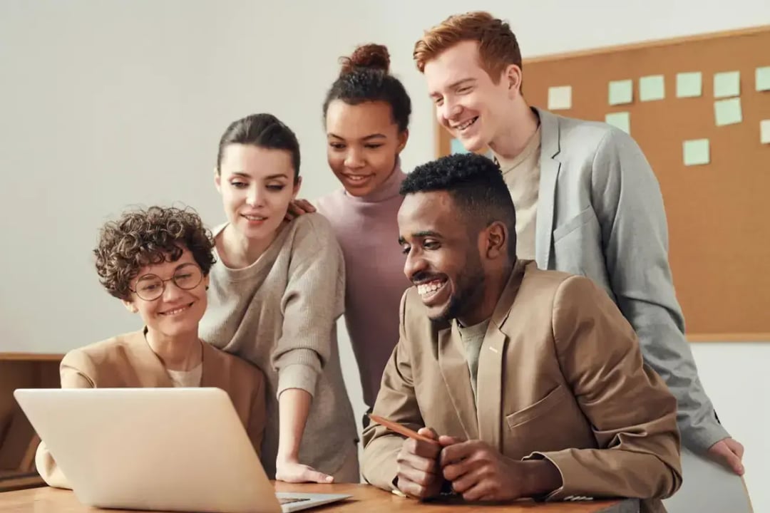 photo-of-people-looking-on-laptop