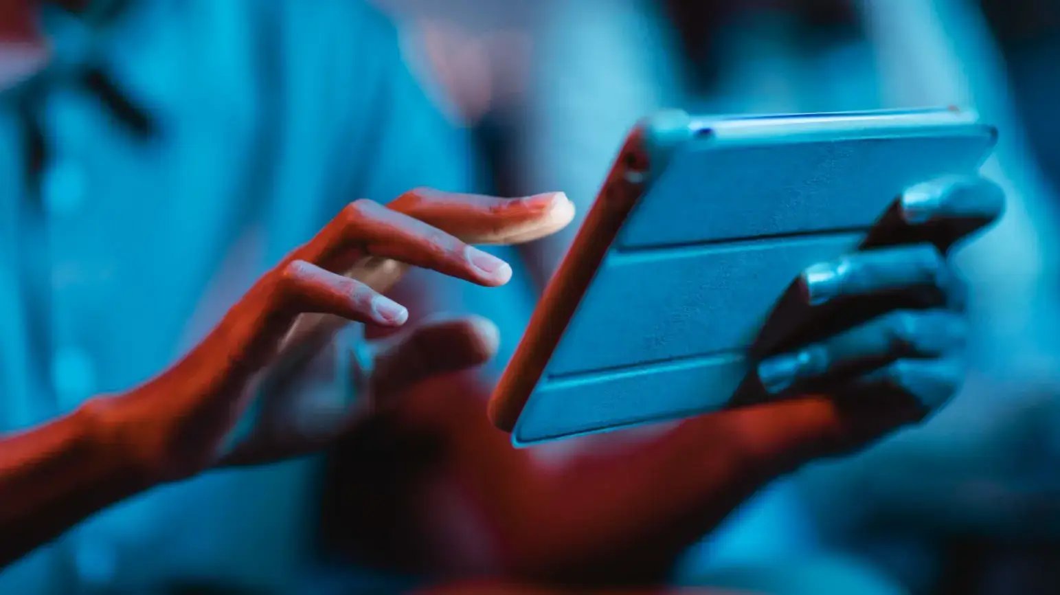 side-view-man-home-using-tablet