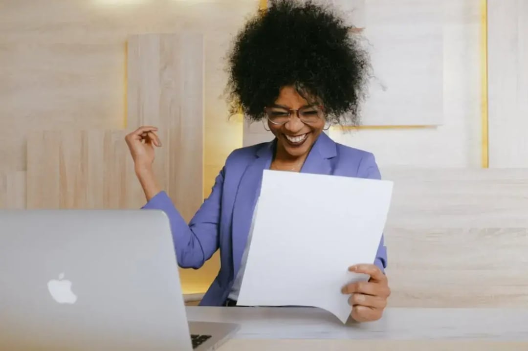 woman-holding-a-paper