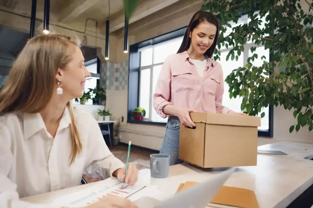 woman-holding-cardboard-box