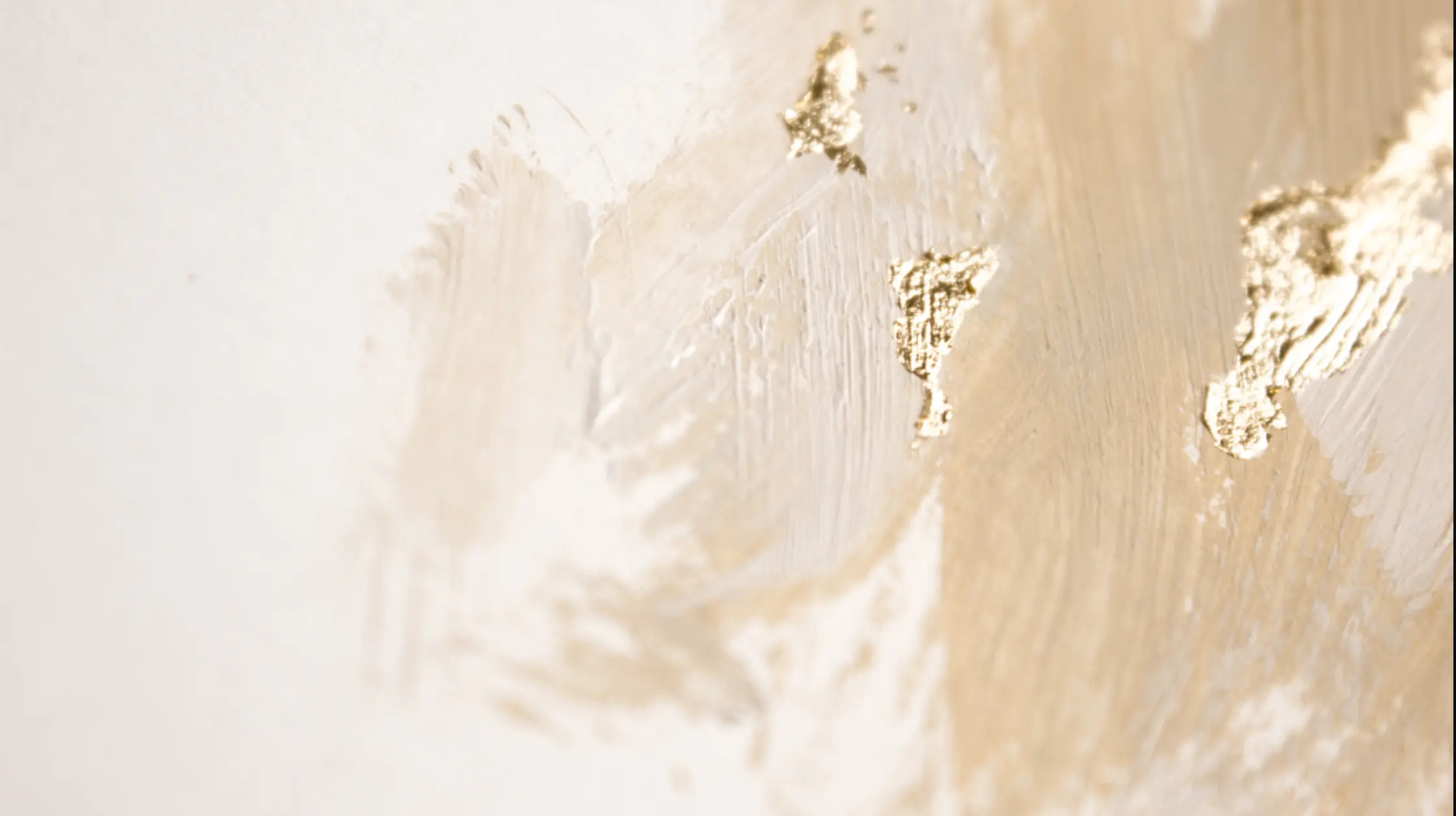 Background of gold paint on a wall