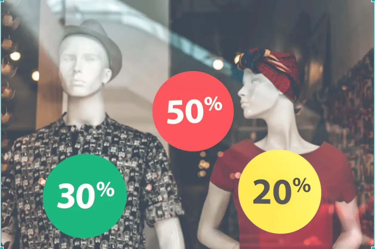 mannequins in window advertising percent discounts-1